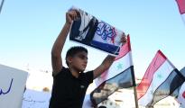 فلسطينيون يحتجون ضد فضائية الجزيرة في رام الله