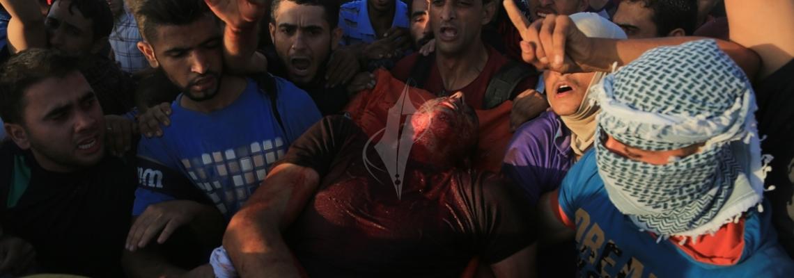 بالصور:"جمعة الغضب" شهداء وجرحى قرب معبر ناحال عوز"تصوير داوودأبو الكاس"