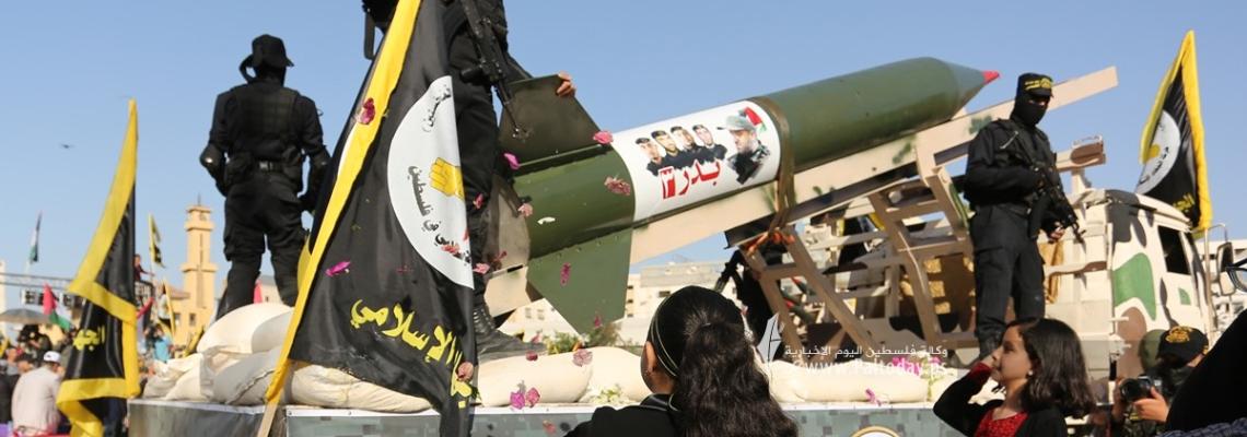 بالصور :أطفال غزة يستقبلون عناصر سرايا القدس بالورود خلال مهرجان "سيف القدس.. اقترب الوعد"