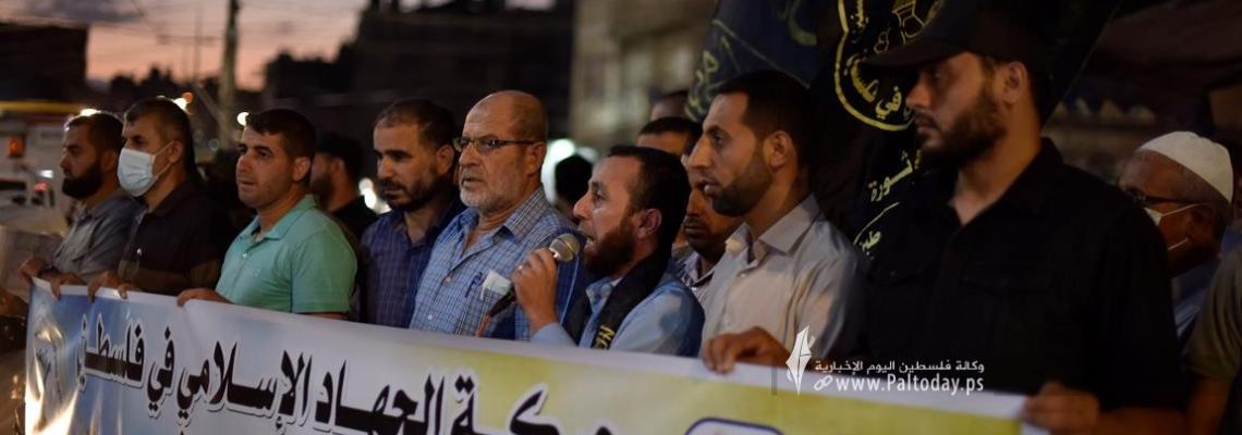 بالصور:"الجهاد الاسلامي" في خانيونس تتظم وقفة ابتهاجا بعملية انتزاع الحرية من سجن جلبوع