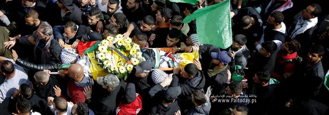 بالصور: تشييع جثمان الشهيد نهاد البرغوثي 20 عاما لمثواه الأخير في قرية كفر عين قرب رام الله