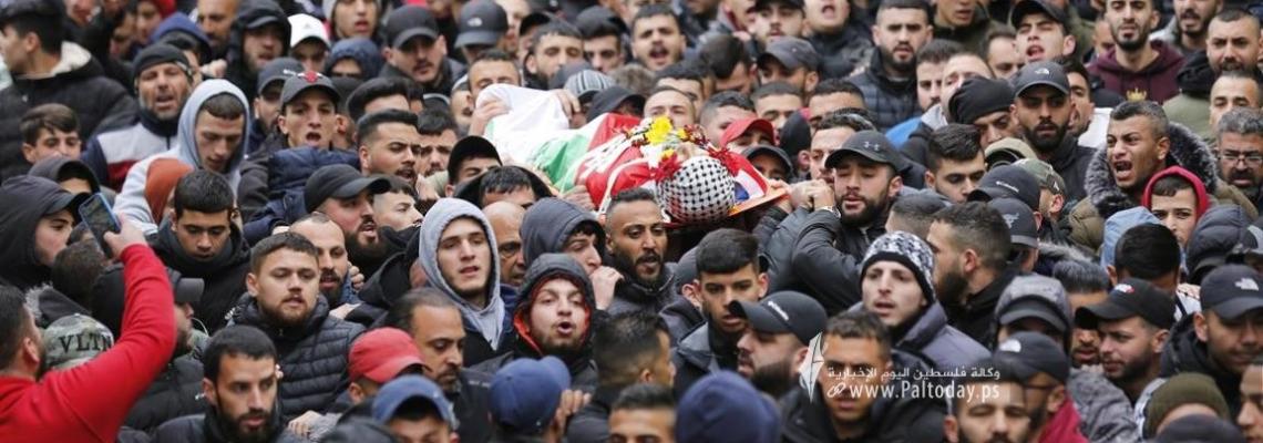 بالصور: القدس - تشييع جثمان الشهيد علاء شحام لمثواه الأخير في مخيم قلنديا شمال القدس