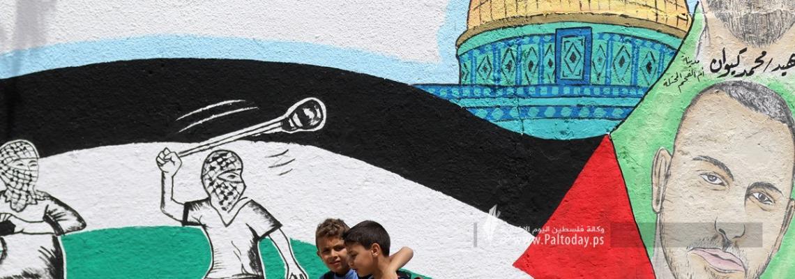 بالصور: جدارية في ذكرى هبة الكرامة على مفترق الجامعة الإسلامية بغزة
