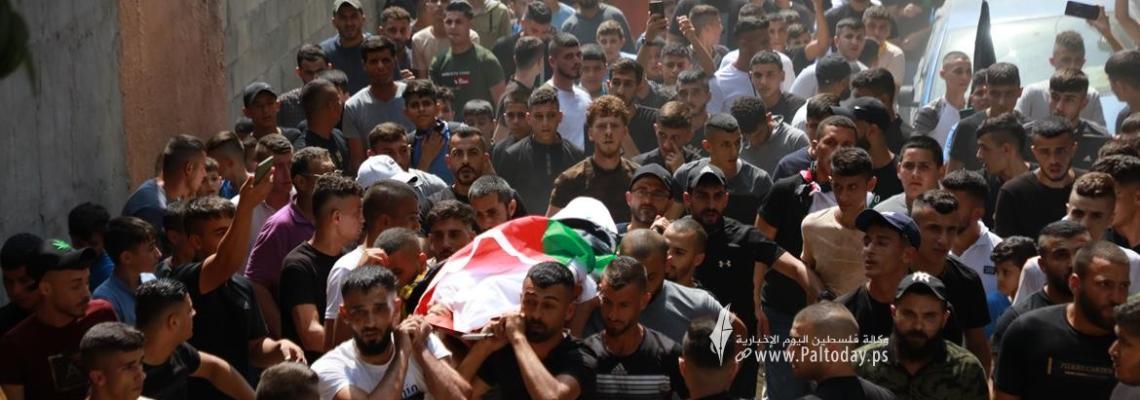 بالصور: جنين - تشييع جثمان الشهيد، طاهر محمد زكارنة ( 19 عام ) إلى مثواه الأخير في بلدة قباطية