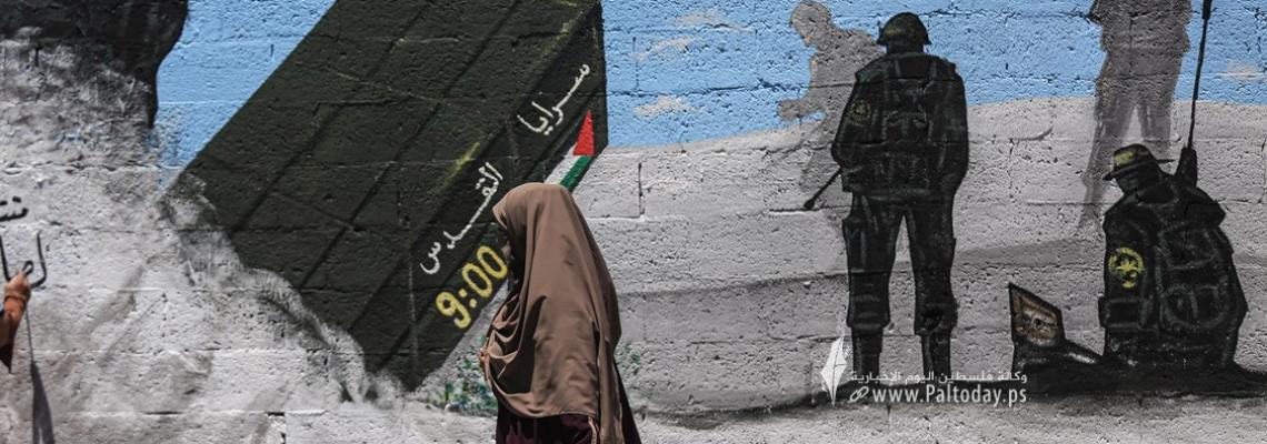 بالصور : جدارية فنية لراجمات سرايا القدس  وسط مدينة غزة