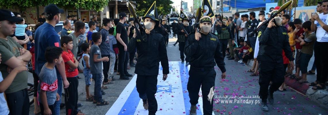 بالصور.. عرض عسكري مهيب لـسرايا القدس برفح في ذكرى معركة وحدة الساحات