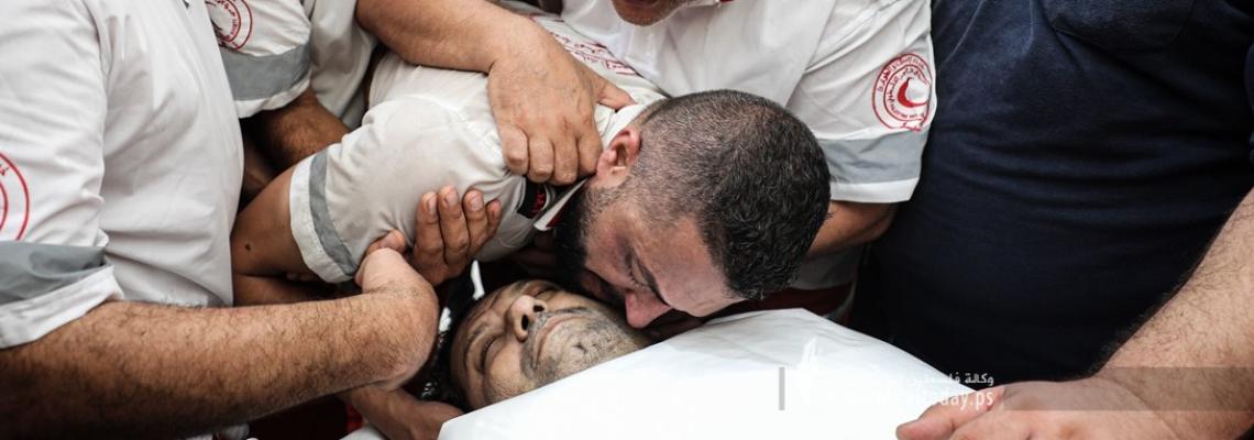بالصور: الهلال الأحمر: استشهاد المسعف حاتم عوض خلال أدائه لعمله الإنساني عند معبر كارمي شرق غزة