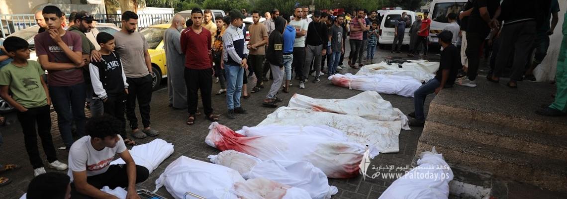بالصور:  جثامين الشهداء امام ثلاجات مجمع الشفاء الطبى