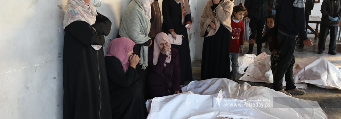 بالصور: وداع 15شهيداً باستهداف منزلين في غزة فجراً