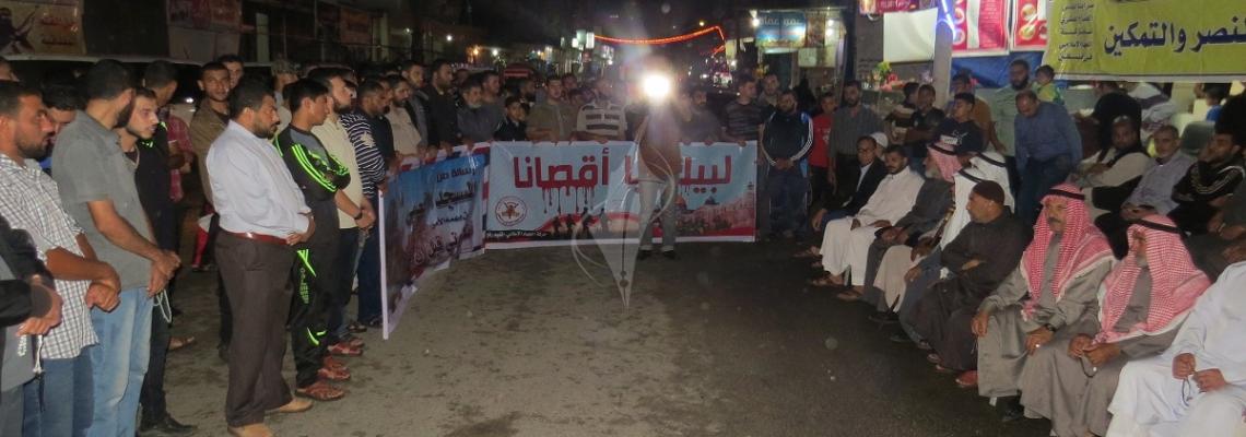 بالصور:الجهاد تنظم وقفة في ذكرى الشقاقي أمام منزله برفح