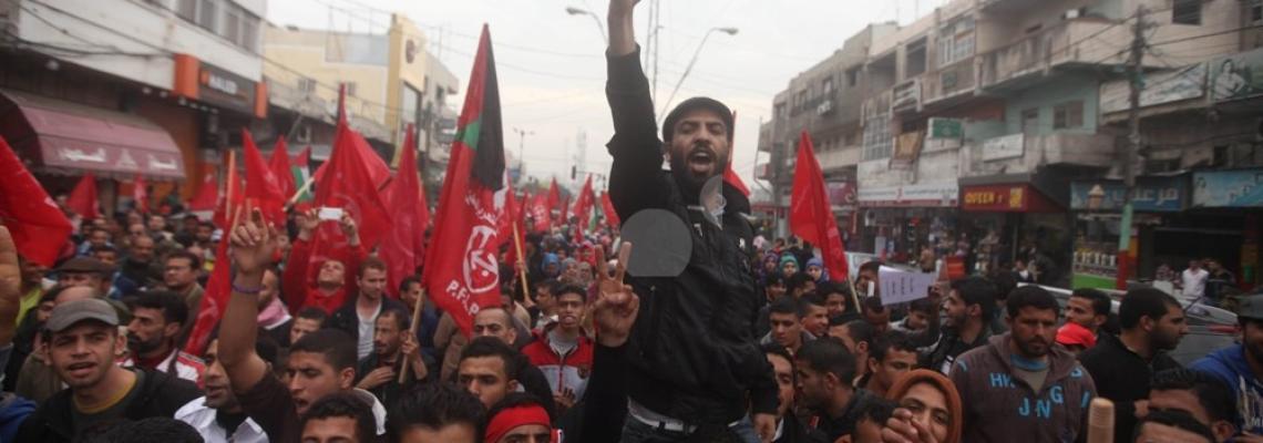 بالصور:انصار الجبهة الشعبية بغزة يحيون ذكرى رحيل الحكيم جورج حبش