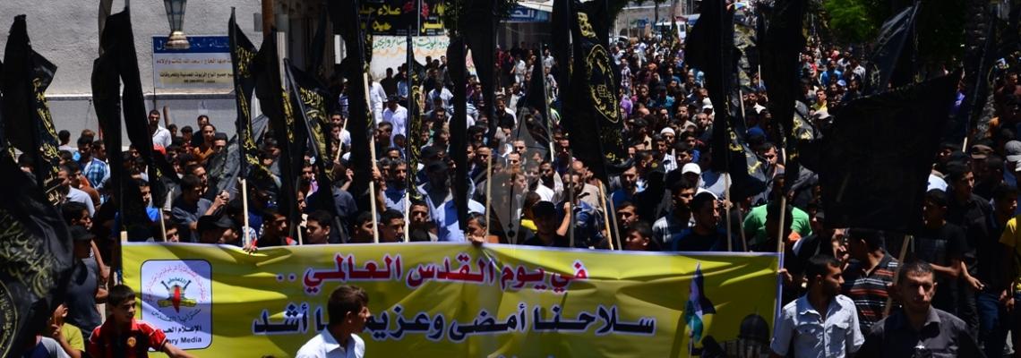 بالصور: مسيرة للفصائل بغزة في يوم القدس العالمي وفي الذكرى الأولى للحرب