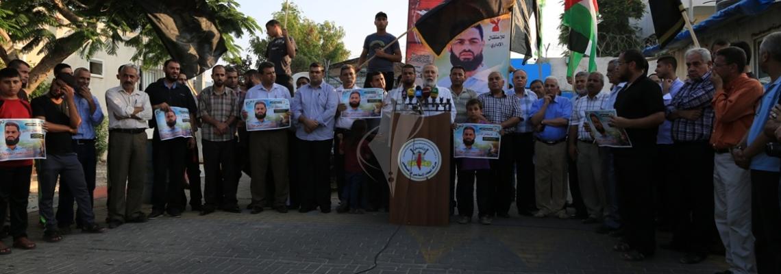 بالصور:الجهاد تنظم وقفة أمام الامم المتحدة تضامن مع الاسير المضرب عن الطعام محمد علان وعائلة الشهيدالدوابشة