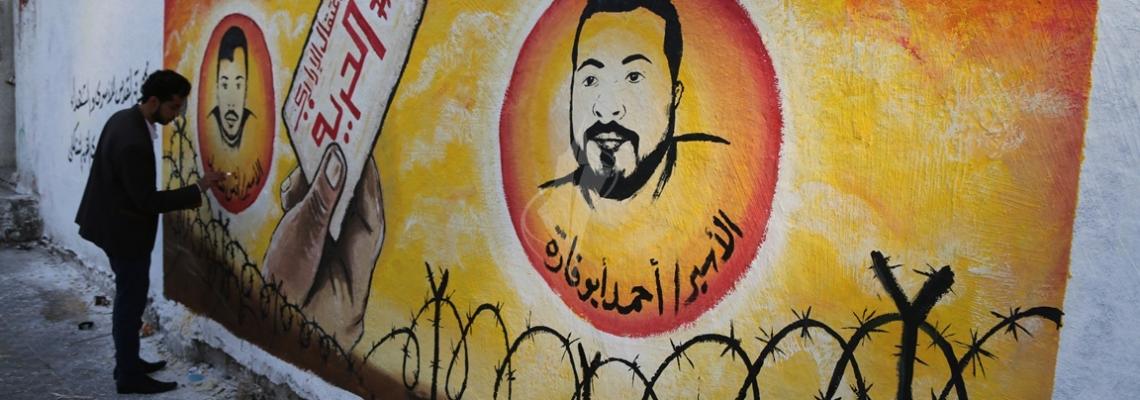 بالصور : مهجة القدس تنظم فعالية رسم جدارية فنية تضامناً مع الأسرى المضربين
