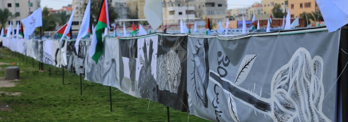 بالصور:غزة تحتضن أطول جدارية في العالم تتحدث عن تاريخ الصراع مع الاحتلال الإسرائيلي