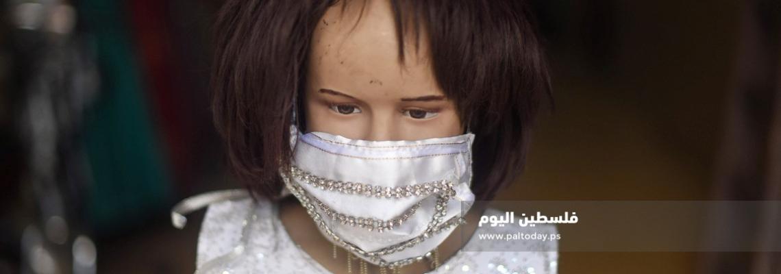 غزية تصمم كمامات " سواريه " للعرائس فى زمن كورونا 