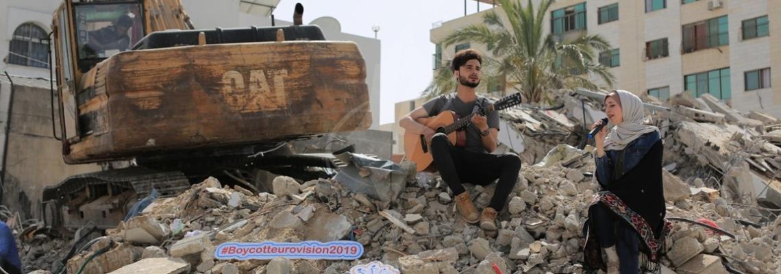 مسابقة مناهضة للتطبيع في غزة بعنوان (غزة فيجن) تقام على ركام الدمار الذي خلفه الاحتلال الإسرائيلي