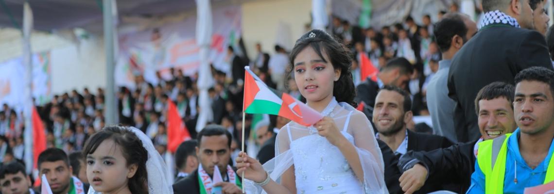 بالصور:مؤسسة تركية تقيم حفل زفاف جماعي لـ 4000 عريس غزي