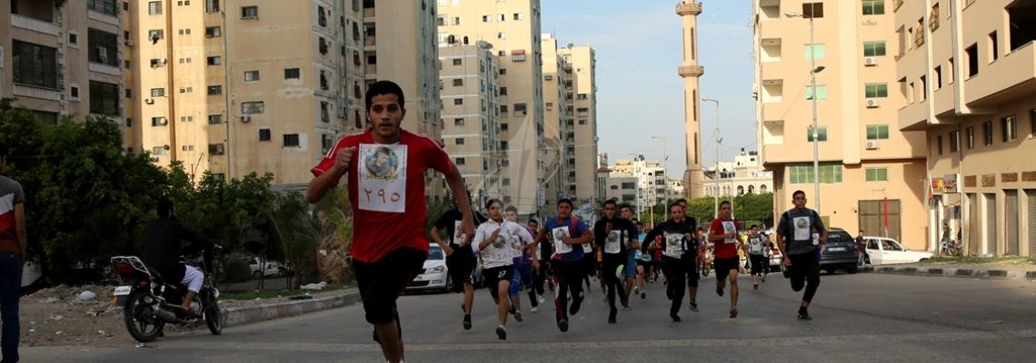 بالصور:الجهاد تنظم مارثون رياضي بعنوان "مش متذكر"
