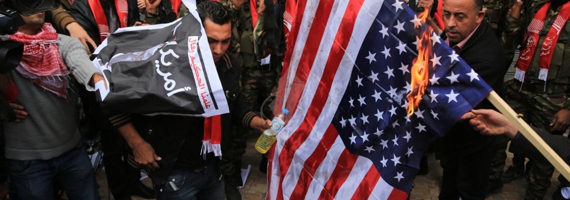 بالصور:الشعبية تحرق صوراً لترامب وعلم إسرائيل وتعلن أن يوم انطلاقتها يوم غضب