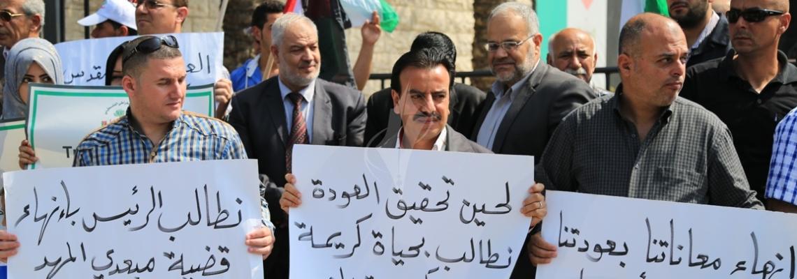 بالصور:وقفة لمبعدى كنيسة المهد أمام مجلس الوزراء في الذكرى الـ14 لإبعادهم