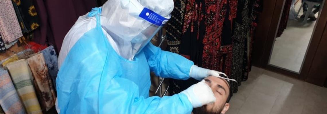 فحص عشوائي لفيروس كورونا وسط خانيونس جنوب القطاع شارع البحر