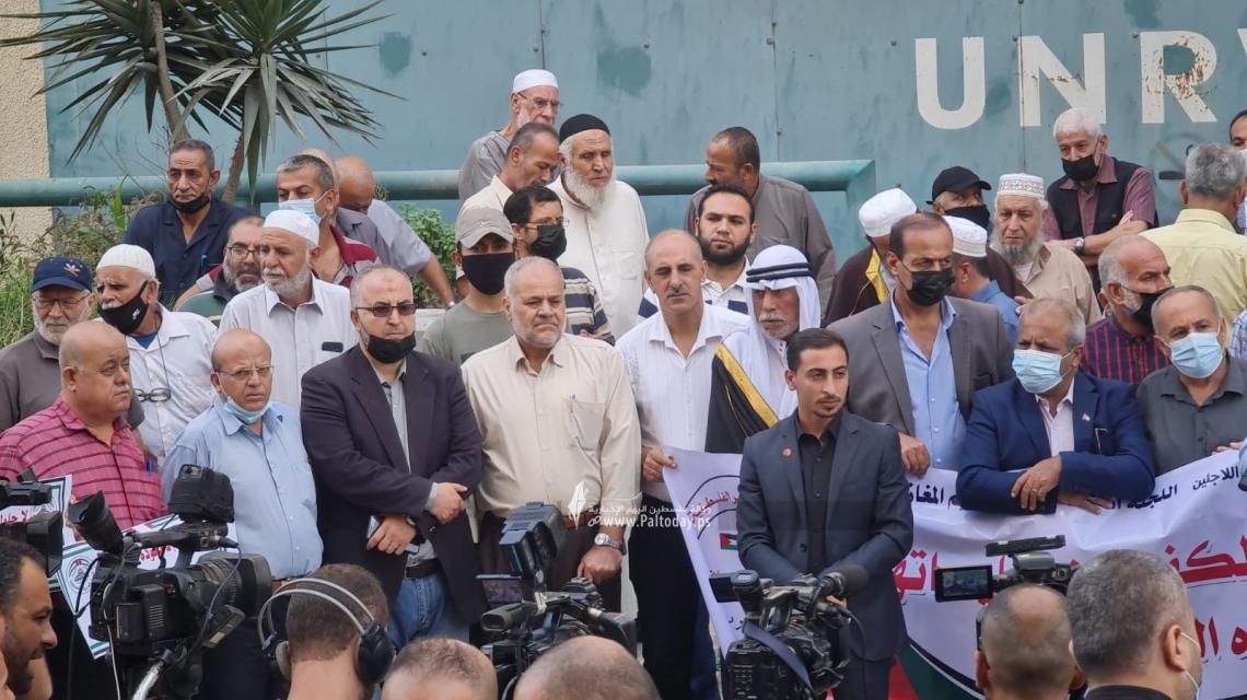 بالصور:اعتصام وطني للجنة المتابعة للقوى الوطنية والإسلامية رفضا لاتفاق إطار التعاون أمام مقر وكالة الغوث بغزة