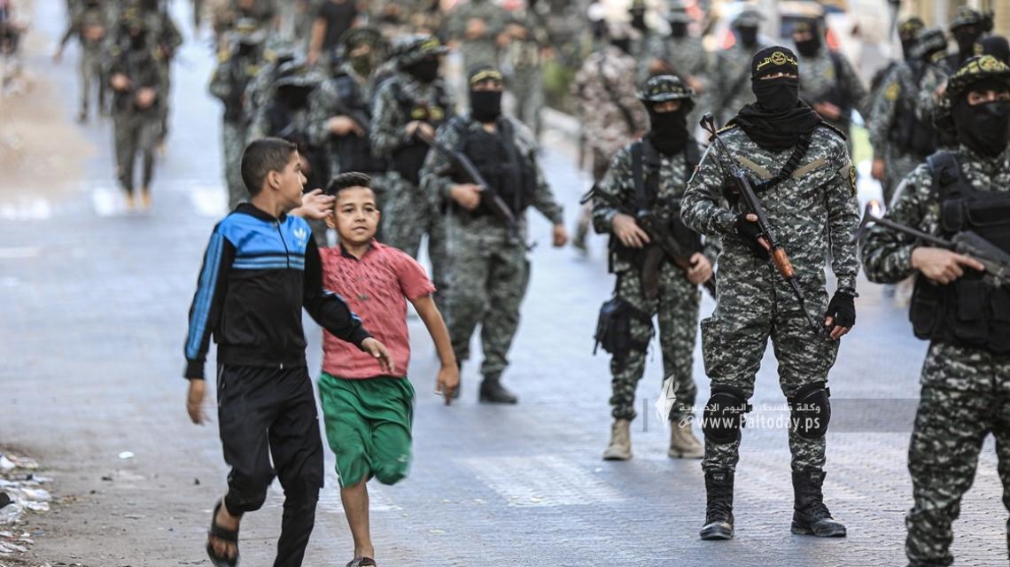 بالصور:مسير عسكري لسرايا القدس لواء غزة"كتيبة الرضوان" بمناسبة ذكرى الإنطلاقة ودعما للأسرى