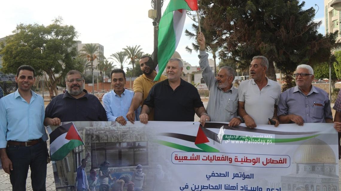 بالصور: وقفه تضامنية للفصائل بغزة مع مخيم شعفاط فى ساحة الجندي المجهول بمدينة غزة