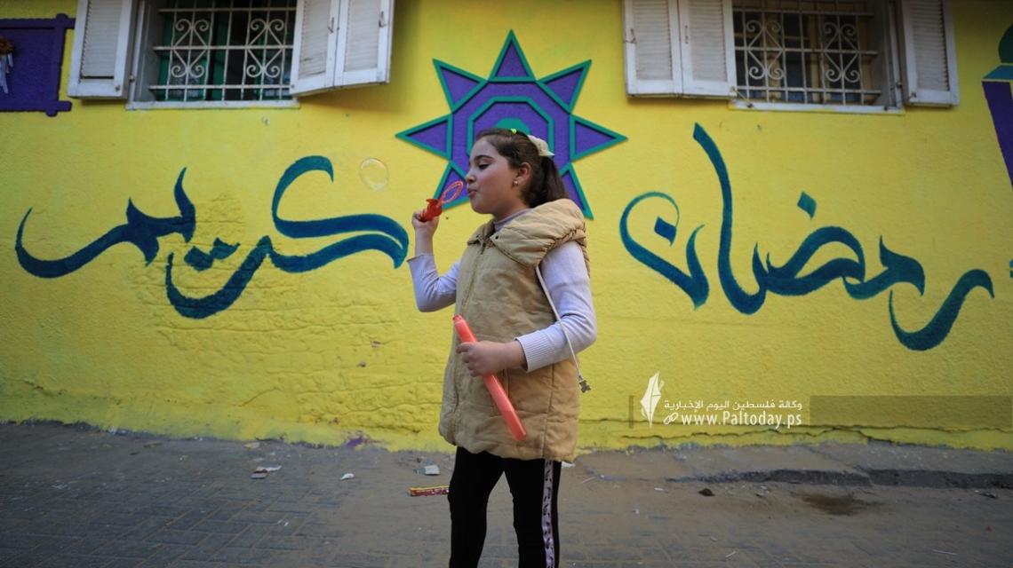 بالصور:  تل الزيتون " الحارة الملونة " كما يحب سكانها أن يطلقوا عليها لا زالت تتزين بأبهى حلة لها في انتظار شهر رمضان