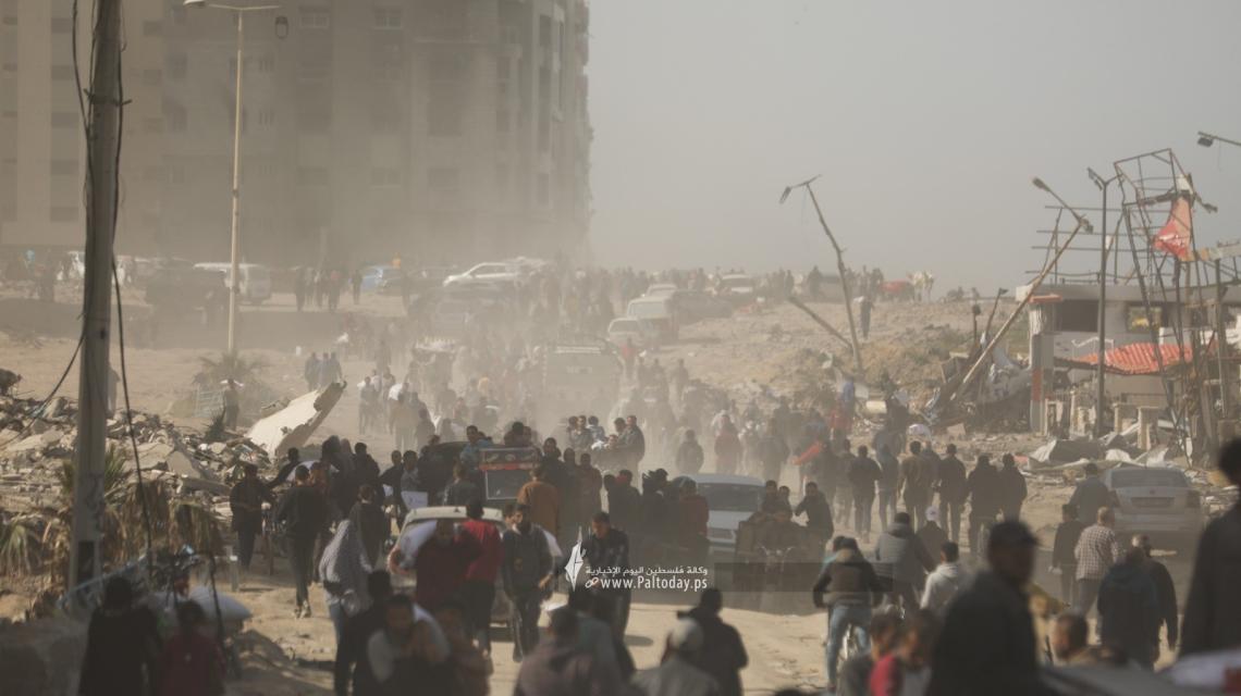 بالصور| جانب من دخول المساعدات الانسانية لشمال قطاع غزة عبر شارع الرشيد