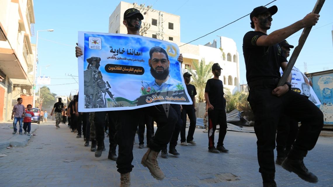 بالصور:الجهاد وسرايا القدس بلواء غزة منطقة اجديدة تنظم مسيراً لأشبال مخيم الفرسان تضامناً مع علان