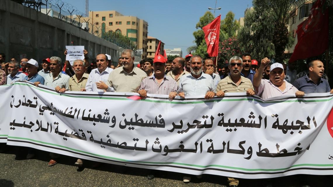بالصور:الشعبية تنظم مسيرة ضد تقليصات الأونروا بغزة