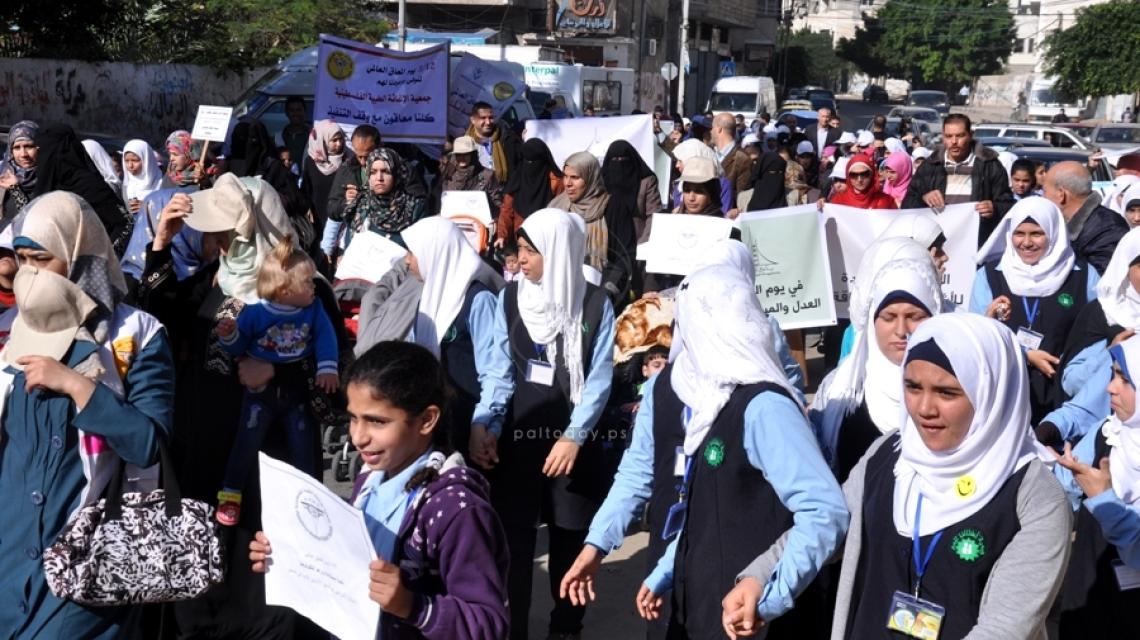 مسيرة امام مقر المندوب السامي بغزة فى اليوم العالمى للمعاق