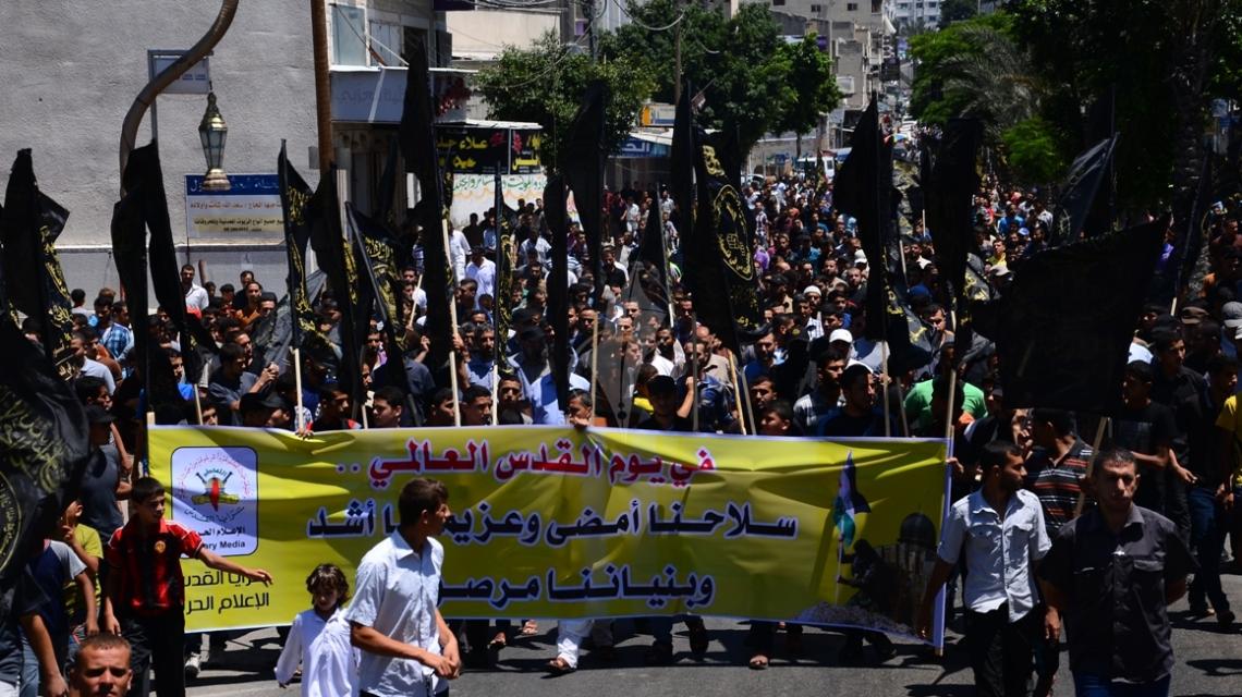 بالصور: مسيرة للفصائل بغزة في يوم القدس العالمي وفي الذكرى الأولى للحرب