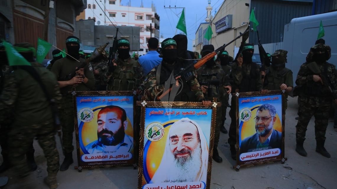 بالصور :عرض عسكرى لكتائب القسام بغزة فى ذكرى استشهاد الشيخ أحمد ياسين