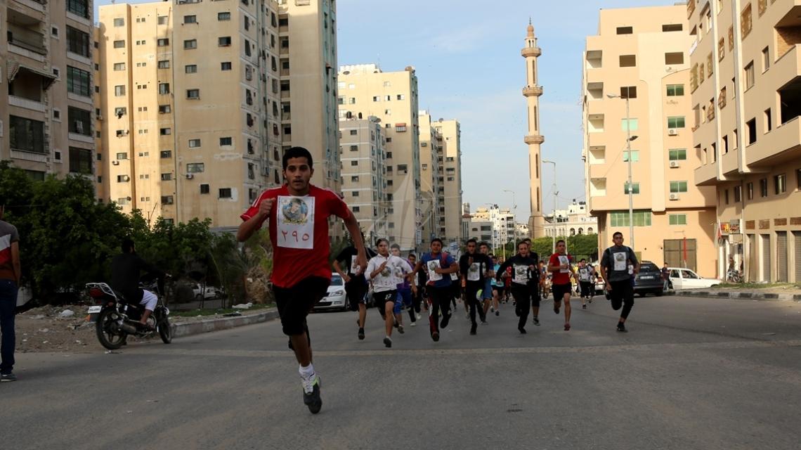 بالصور:الجهاد تنظم مارثون رياضي بعنوان "مش متذكر"