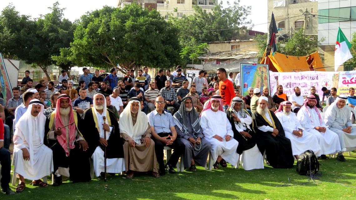بالصور: الجهاد تنظم وقفة تضامنية إحياءً لذكرى النكبة برفح