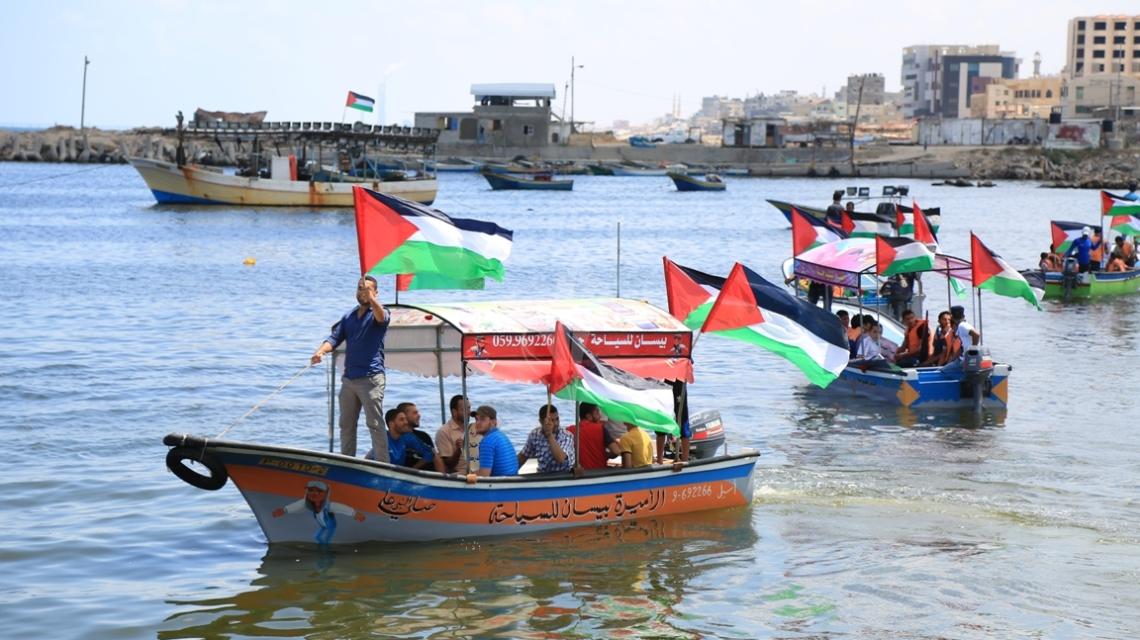بالصور:مؤتمر ومسيرة بحرية لاستقبال أسطول الحرية 3بميناء غزة