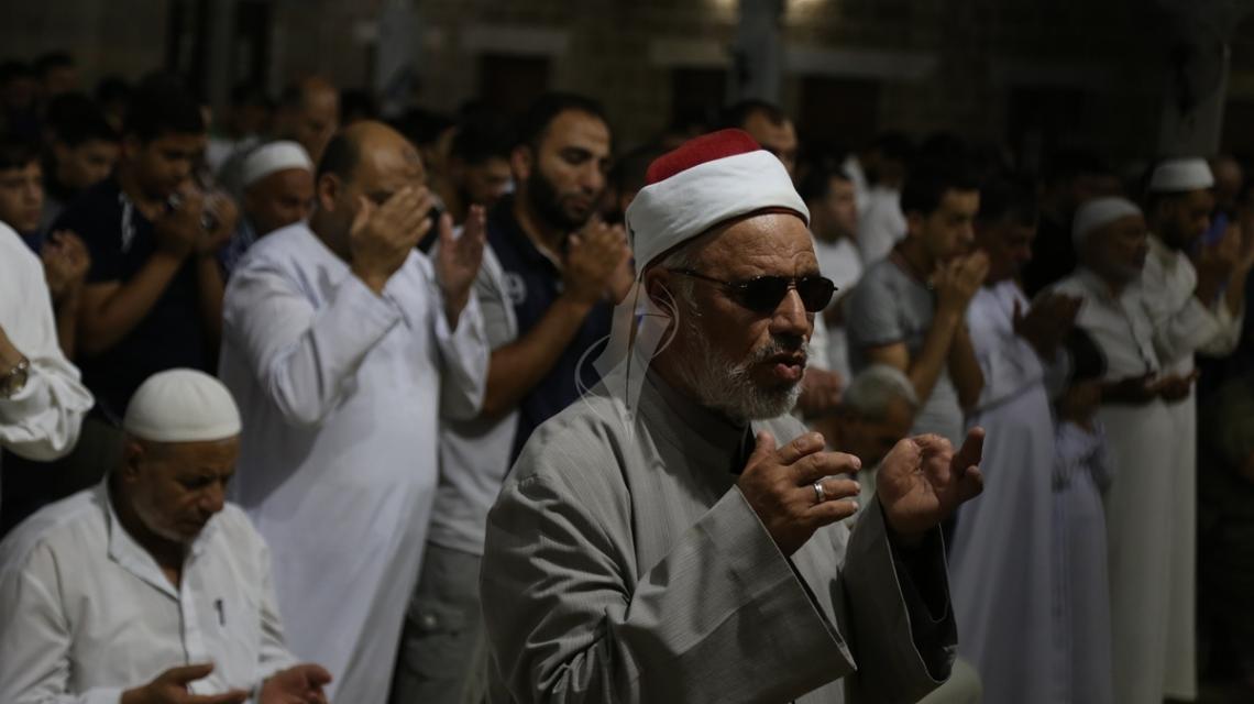 بالصور: احياء ليلة القدر بمسجد السيد هاشم شرق مدينة غزة
