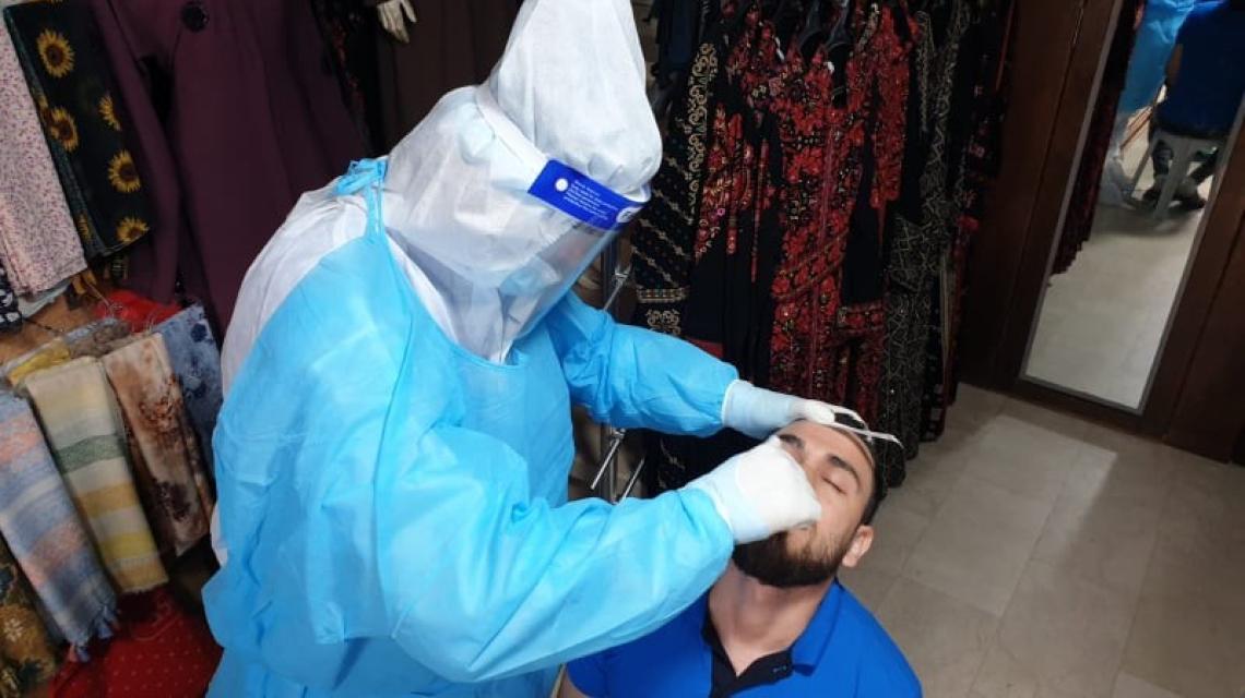 فحص عشوائي لفيروس كورونا وسط خانيونس جنوب القطاع شارع البحر