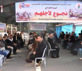 وقفة تضامنية بغزة مع اللاجئين الفلسطينيين في مخيم اليرموك في سوريا