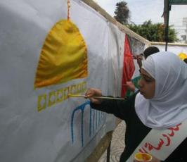 بالصور.. أطفال فلسطين يرسمون على الجدران