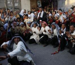 بالصور.. زفاف شقيقين في خيمة بعد تدمير منزلهما في الحرب الاخيرة في بيت حانون‏