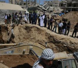 بالصور: عمليات انتشال الشهداء والمفقودين بعيد قصف منطقة الأنفاق بمدينة رفح‏