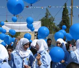 بالصور: إطلاق العام الدراسي الجديد من مدرسة قلنديا المحاصرة بالجدار شمال القدس‏