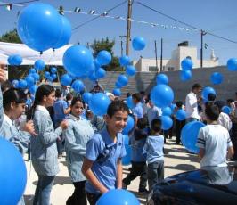 بالصور: إطلاق العام الدراسي الجديد من مدرسة قلنديا المحاصرة بالجدار شمال القدس‏