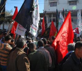 بالصور:: اعتصام القوى الوطنية مع أهالى الاسرى بذكرى الحرب امام مقر الصليب الاحمر بغزة
