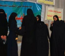 بالصور:: دائرة العمل النسائى لحركة الجهاد توزع زى شرعى (الجلباب) بالتعاون مع جمعية بيت فلسطين