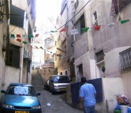 بالصور.. لاجئون في مخيم شعفاط